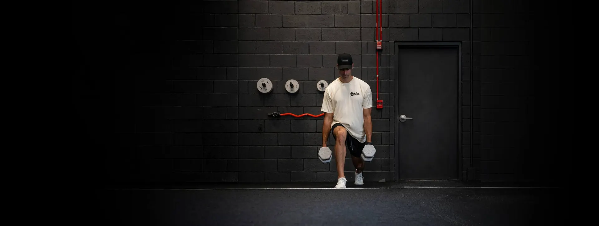 Pat O'Donnell training with dumbbells at the Sixteen Elite gym in Jupiter, FL